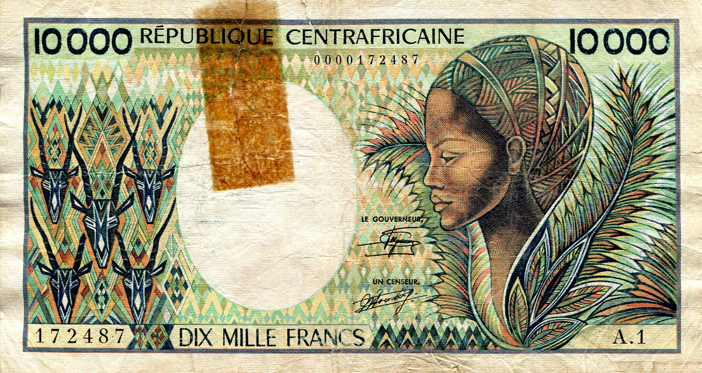 Central African Republic 10,000 Francs VG (see large scan - tape residue) pick #: 13