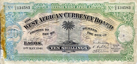 British West Africa 10 Shilling Pick Number: 7e G (see large scan - tape residue) Banknote