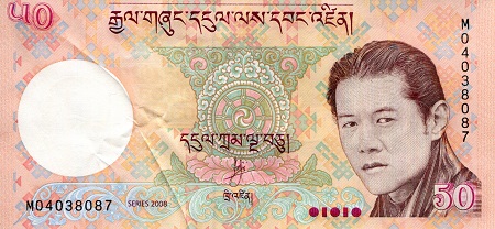 Bhutan 50 Ngultrum Pick Number: 31a aUNC/XF (crimp on note) Banknote